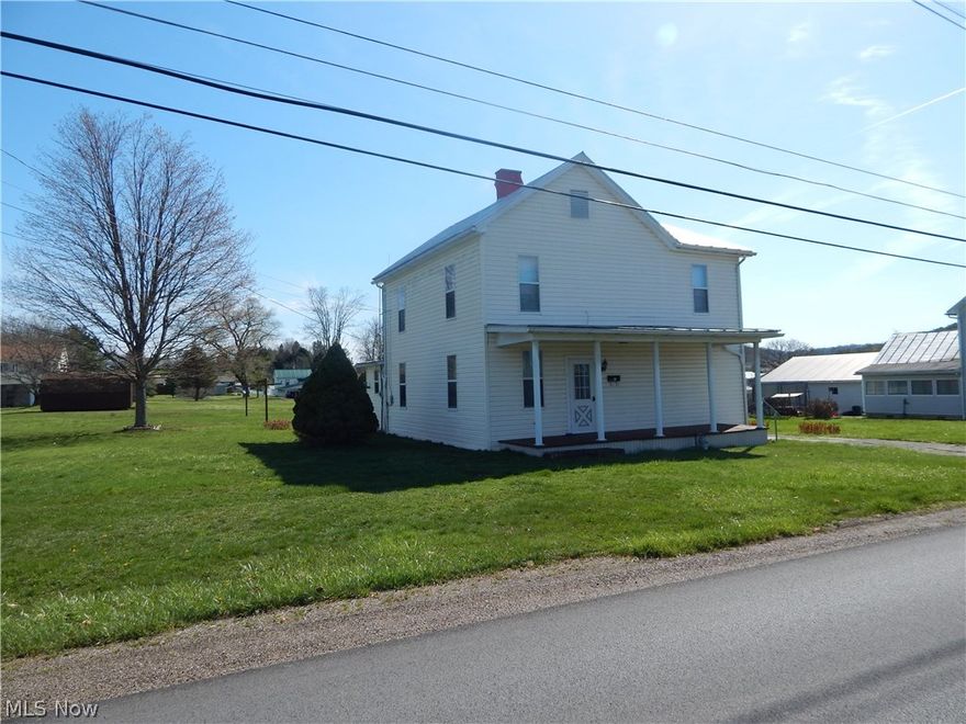 TIMELESS TWO STORY!
This home has a story to tell.  In the years past, this two story stood tall as a farm house in Harrisville.  Walking in the front door, the beautiful woodwork can be seen in all directions.  Decorative mantles, wood trim, the staircase, adorable doors with glass panes and glimpses of gleaming hardwoods here and there.  Character is abundant in this grand home.  The spacious kitchen is big enough to eat in but there is also a formal dining room, if needed!  The layout of this home even allows potential for a possible 4th bedroom upstairs.  The large utility/laundry room is on the main level and this is where the old hand pump still stands with a wash tub that reminds you of days gone by. If you enjoy being outdoors, the covered front porch is a great place to sit a spell or, the back deck would make a nice place for barbeques!  The home sits on nearly half an acre lot with a detached garage and the old barn has been vinyl sided and provides plenty of storage! Call