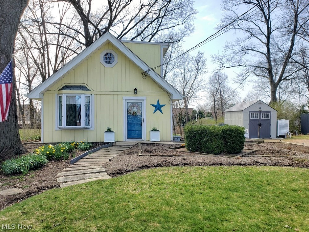 orgeous Century Home in Northfield Village! 3 full bedrooms, 1 full bath on a larger .46 acre lot... a rarity for the village! Newer Furnace (2003), New Hot Water Tank (2016), New Roof (tear off with wood replaced, 2017), most Windows replaced (2017), New Back Door (2017), Glass Block Windows in Basement (2017), New Bathroom Vanity, Cabinet, and Toilet (2017), New Siding on Dormer and Chimney (2017), New Gutters and Downspouts (2017), new luxury vinyl flooring and kitchen cabinets (2020). Enjoy privacy with the fenced in Backyard and enjoy gardening with the fenced and raised Garden Bed. Custom features include Built-In Shelving in 1st Floor Bedroom, tons of charm, and Ceiling Fans for those cool summer nights. Appliances and Security System included. Bedroom 3 is a tandem bedroom off bedroom 2 and is perfect for a nursery, exercise room, or home office. The basement is a cellar that houses the mechanicals and washer and dryer. (Seller has an estimate to move the laundry upstairs if th