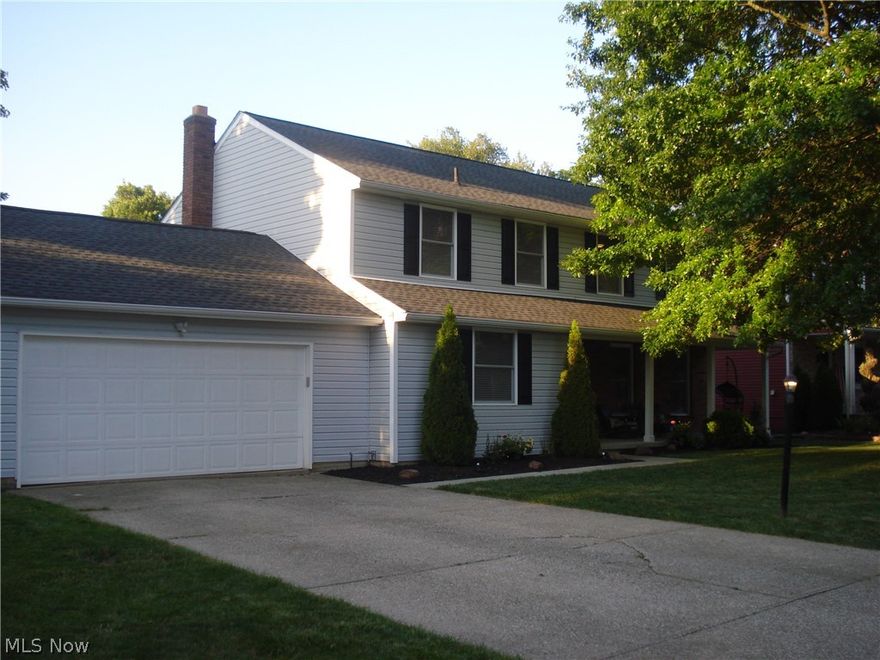 Welcome to this stunning home, this Colonial is spotless from top to bottom and has been tastefully remodeled. We have 4 bedrooms and 3 full and 1 half bath. All of the bathrooms have heated ceramic floors and under cabinet lighting with granite counter tops. A first floor office or additional bedroom. The spacious living room is warm and inviting and flows into the formal dining room with Pergo flooring. The fabulous kitchen has shaker style soft close cabinets, granite counter top, subway glass tile back splash, Pergo floor, and stainless steel appliances refrigerator, range/oven, dishwasher and microwave. The comfortable family room with a fireplace and Pergo flooring flows into the kitchen with access to the deck to enjoy with Lake and woods views. The upstairs master suite has a walk in closet, a private bath with a tiled shower. There are 3 additional spacious bedrooms. The full finished Rec room with a wet bar is any one's dream 42 x 13 with plenty of space for gatherings and en