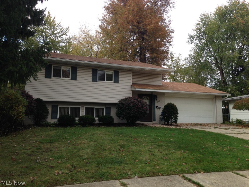 Welcome home to this unique 4 bedroom BiLevel home that has the feeling of a spacious colonial. You will enjoy the updated, eat in kitchen that opens to the large family room. A large mudroom with laundry and half bath/utility room finish off this lower level. Off the back you can appreciate the private fenced back yard from your 3 season room with its own heat source for the chillier evenings! Upstairs you will find hardwood floors throughout the nicely sized bedrooms with ample closet space and a full bathroom. The master bedroom even has its own half bath. This home is priced to sell! Dont miss it!