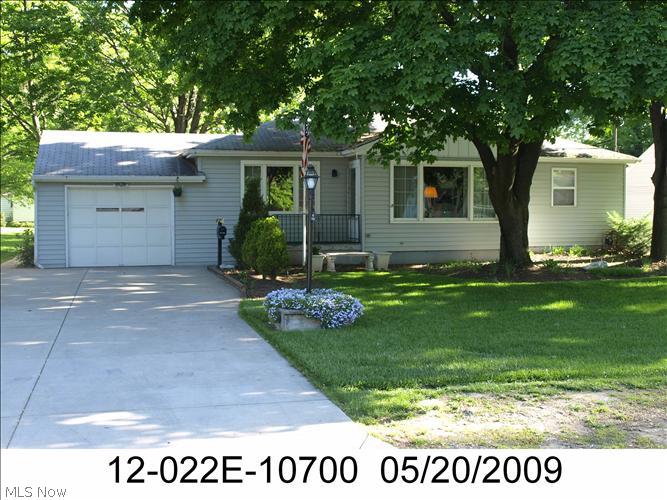 Very deceiving, 3 Bedroom ranch. Over 1700 sq.ft. of living space w/1 full plus 2 half baths. Vinyl exterior. Attached. single garage with extra storage area. Double wide, concrete driveway. Rear deck. Large, open LR/DR with beautiful cove molding. Freshly painted throughout. Hardwood floors throughout. Spacious bedrooms. Paneled family room with see-through fireplace to the living room. Kitchen with all appliances with ample eating space. Vinyl windows throughout. Full basement with 15x45 Rec room and another separate Kitchen w/appliances. This area is super for entertaining. Half bath in basement. Washer and dryer are included. Gas, forced-air heat with central A/C. Call today for your appointment!