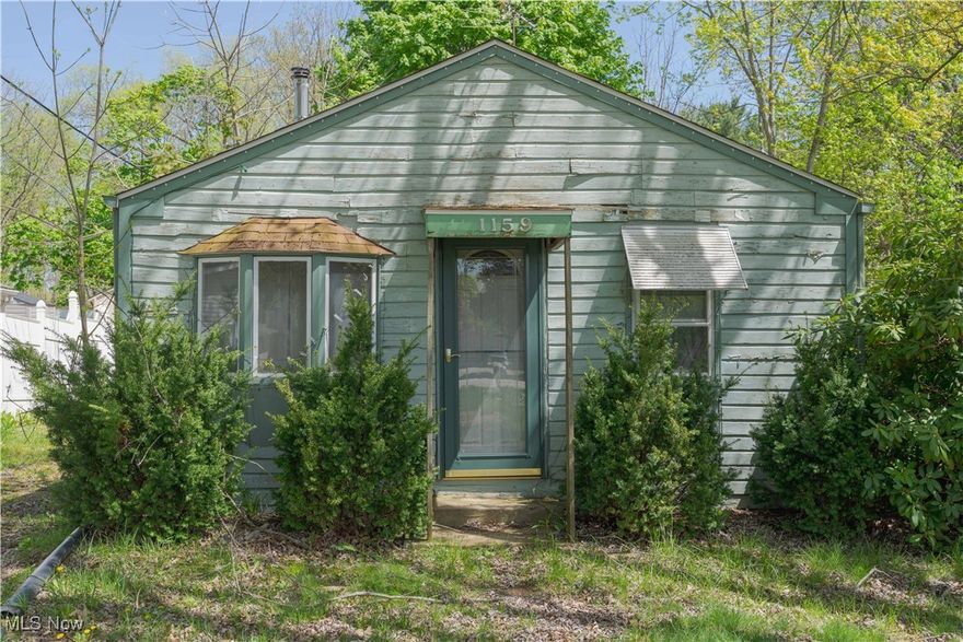 Calling all investors, flippers, and visionary buyers — here’s your chance to bring new life to a property full of potential. This 2-bedroom, 1-bath home offers just under 900 square feet of living space and sits on a nearly 1-acre lot in a desirable Tallmadge location. Whether you're looking for your next flip, a renovation project, or a site to tear down and build your dream home from the ground up, this property checks all the boxes. The house needs significant work, but the land, location, and possibilities make this a rare find. Don’t miss your chance to turn this diamond in the rough into something truly special. Property is being sold as-is. Call your favorite agent today to schedule your time to get inside.