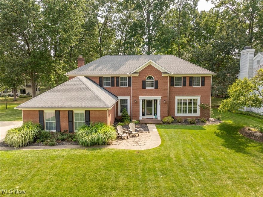 Pride in ownership! Located in the Vineyards, this stately brick beauty has been loving cared for by the same family since 2003 and boasts a long list of mechanical and cosmetic updates. Upon entering, you are met by a grand, 2-story foyer, dramatic staircase and chandelier. The first floor office is complete with built in cabinets and desk. The star of the first floor is the kitchen. No details were over looked in this careful remodel that includes soft close cabinets, granite countertops, stainless steel back splash, stainless steel appliances including a 40" dual fuel stove, commercial hood, pot filler, warming drawer, twin refrigerators, beverage refrigerators, all new electrical, island with stool seating and a second sink with water filter and garbage disposal. The newer sliding glass doors offer views of the beautiful stamped concrete patio and backyard. The family room is anchored by a brick fireplace and wooden built in cabinets and has been recently updated to reflect a contemporary color pallet and LVP floors. The first floor is complete with a half bath and laundry room, both completely updated including a new washer and dryer. The laundry room serves as entry point to the attached 2 car garage that features customized built in storage. The grand primary suite has double entry doors, oak hardwood floors and new closet system! The primary bath features a water closet, double vanity, stand alone shower and large tub, all in neutral color pallet. The second floor offers 3 additional nicely sized bedrooms as well as new carpet in the hall landing! The partially finished basement offers ample storage and sump-pump with battery back up. The finished side is carpeted, adding a third living space! Mechanical and structural updates include: Furnace/WIFI thermostat (2017), Tankless water heater (2024), Roof, gutters, fascia (2010), driveway (2015), Stamped concrete patio (2019) Gazebo (2021). Detailed list of ALL updates available!