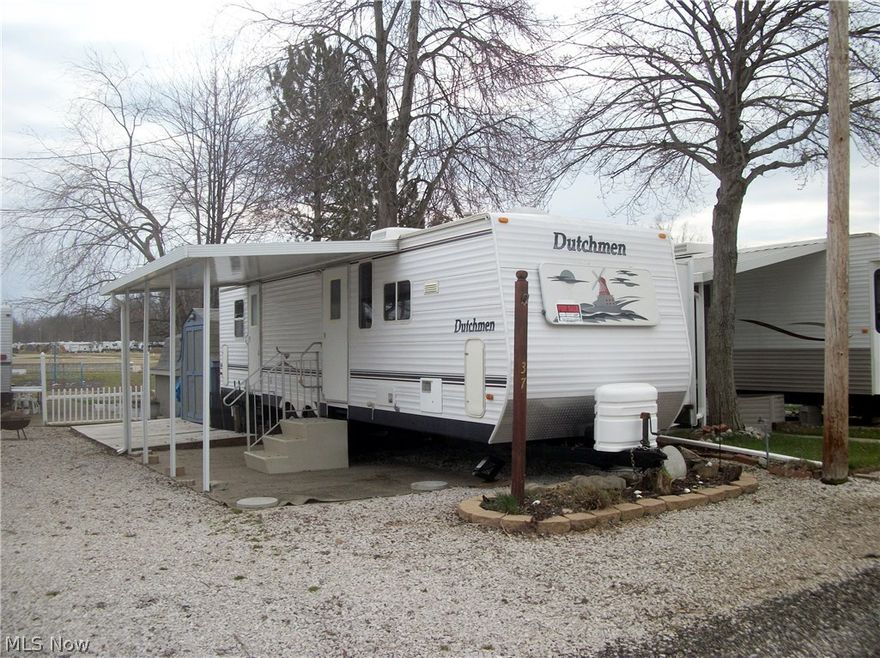 Beautiful 31 ft. mobile in the resort area of Indian Creek. Private Resort, Dutchman front kitchen, living room, king size bedroom, large shed. Turn key summer living.