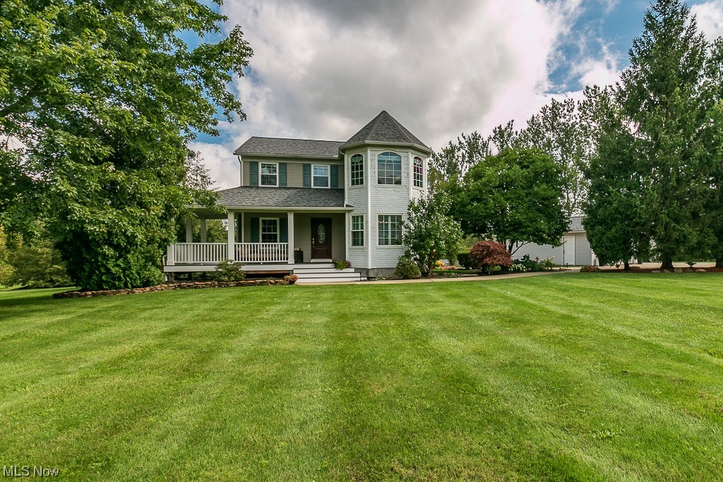 Welcome to this amazing 4-bedroom, 2 full bath Victorian style home on a beautiful 2.2-acre lot in a quaint area on the Chardon, Leroy line. The main floor features an exquisite Great Room with a vaulted ceiling, hardwood flooring and a cozy stone walled fireplace, a large office and a first-floor laundry. The spacious living room boasts a beautiful front entry way with a gas fireplace which opens to the large eat in kitchen with a walk-in pantry, The second level includes the Master bedroom featuring a Sitting/Morning room with a wealth of natural light, two additional Bedrooms and a full Bath. The lower level has a finished Recreation room, a Bedroom which is currently used as an Exercise room, a Media/Theater room and a Workshop area in the Utility room. Exterior features a welcoming totally rebuilt maintenance free large front porch and a beautiful large deck off of the Great room, a large, detached garage and an extended driveway for a boat, RV or truck/equipment. Some of the upda