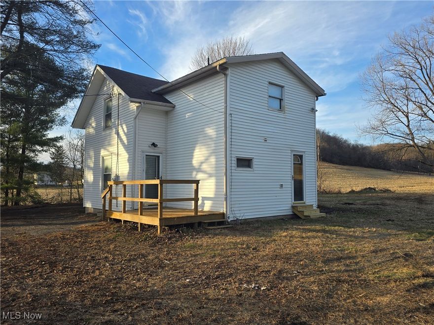 Embrace the tranquility of country living in this home nestled on a sprawling acre in the desirable Ridgewood School District. This inviting 3-bedroom, 1.5-bath property boasts a spacious, flat yard perfect for outdoor gatherings and endless possibilities. Step inside to find a large kitchen that flows seamlessly into a cozy living room adorned with hardwood floors. Enjoy the convenience of main floor laundry and a well-appointed full bath. Upstairs, three generously sized bedrooms await—two feature beautiful hardwood flooring, while the back bedroom includes a private half bath. With an attached 3-car garage, you'll have ample space for vehicles and storage. Don’t miss your chance to make this lovely house your home! Schedule a viewing today and experience the charm for yourself!