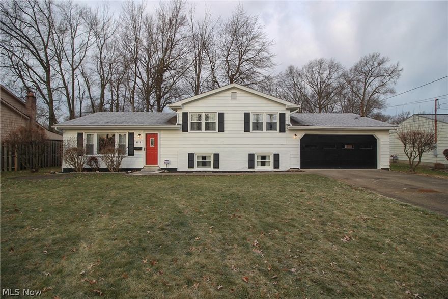 Welcome to this beautifully renovated 4 bedroom, 1.5 bath split level home in Austintown, LSD. This home features an open floor plan and has been updated to include modern amenities. The main living space offers spacious living and dining areas, perfect for entertaining. The kitchen boasts new cabinetry, new countertops and stainless steel appliances. Upstairs you will find three bedrooms and a full bath. The lower level has a large room that can be used as the 4th bedroom or a family room and also has a half bath. The attached garage provides plenty of storage space. The backyard is perfect for outdoor activities or enjoying the cool spring breeze on the covered porch. This home has been thoughtfully renovated and is ready for you to move in and make it the perfect place to call home.