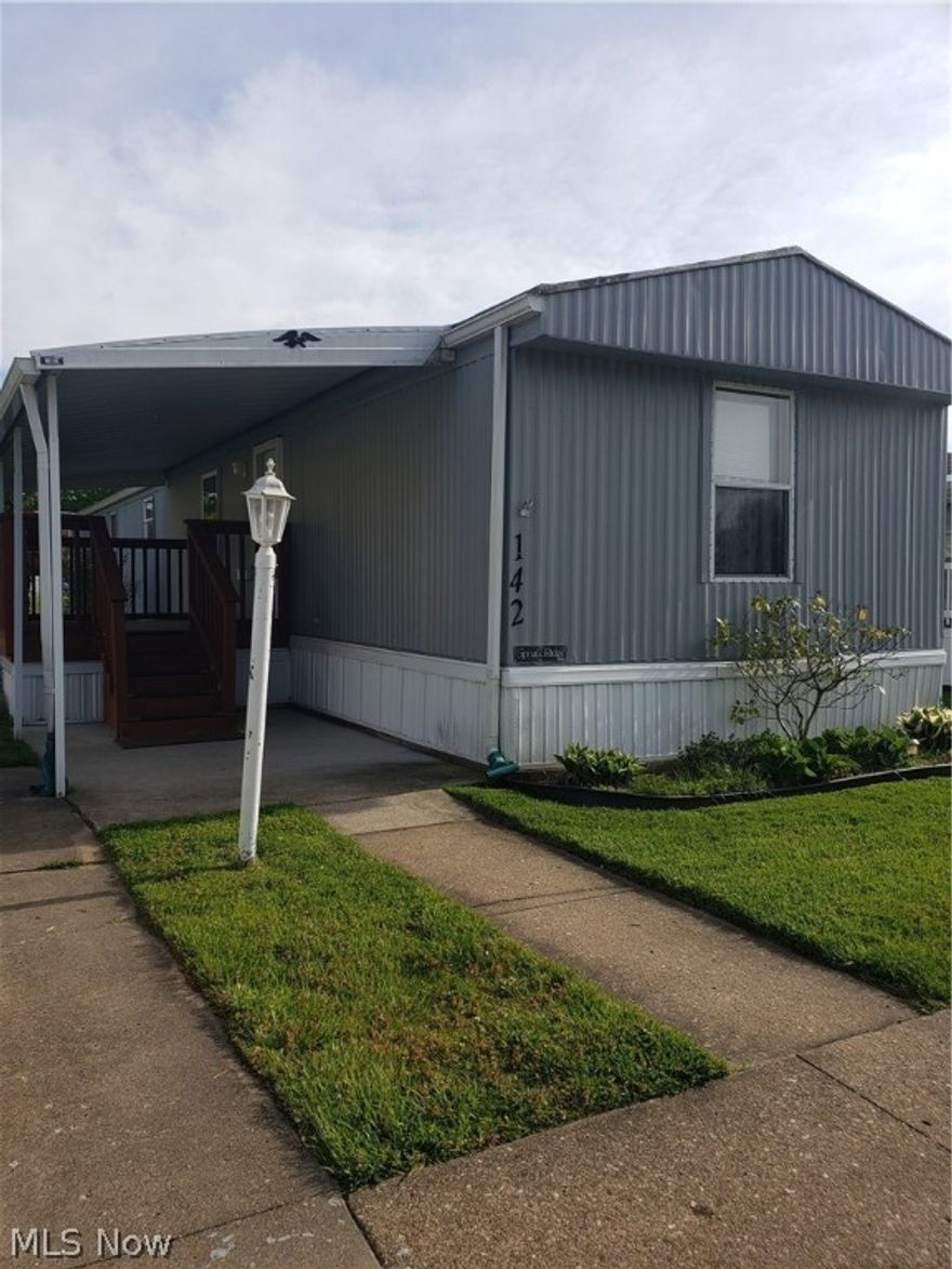 Adorable neat and clean 2 bedroom, 2 bath mobile home with shed, patio, and covered deck. Many improvements in the last couple years. New carpet in master bedroom, master bath was renovated approximately 2 years ago with new shower, flooring and hot water tank. Second bedroom also has newer flooring. Appliances stay - no warranties. New window in living room and storm door in 2020.