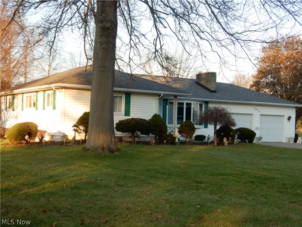 Beautiful, spacious ranch home situated on a well maintained 3/4 acre lot. This home has quite a story to tell. Built and loved by the same owners for the past 56+ years. This property has served it's current family well and there have been many fond memories made that will be cherished for years to come. The time has come though to pass it on so that another family can create memories of their own. There have been many updates over the years which include: Updated kitchen and dining area which opens nicely to the living room and additional living space in the family room, (lower level). You will find quality oak tongue and groove hard wood flooring under all carpet in the house as well as under the flooring in the dining area. Outside, you will appreciate the updated windows and siding. The roof, gutters and downspouts were replaced in 2005 with 30 yr. shingles. The double concrete drive has a large turn-a-round and enters the over-sized 2 car garage and each door has an opener. Out