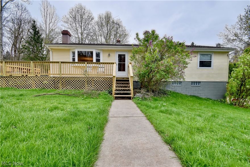 Discover the epitome of comfort in this beautifully updated ranch-style home with several updates throughout. Nestled in a serene neighborhood in Chagrin Falls, this 3 bedroom, 2.5 bathroom residence offers effortless living and entertaining spaces. Step inside to find a seamless blend of classic charm and contemporary flair, highlighted by new cabinetry and flooring. From the kitchen to the cozy living areas, every corner exudes warmth and style. Outside, enjoy a beautiful deck perfect for outdoor gatherings or serene relaxation. With its desirable location and thoughtful upgrades, this ranch-style gem is ready to welcome you home.