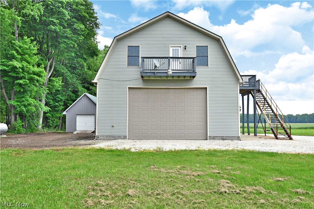 2 bedroom home on 2 acre lot that could be converted back to single family home. Walk in on the first floor to an open eat in kitchen and master bedroom with bathroom and also laundry hookup in master bathroom. Up the stairs to a living room area and then a bathroom and another sitting area. Separate entrance to upstairs unit but they do connect by a door. Second floor unit has a living room, kitchen area, bedroom, bathroom and laundry room. Large attached garage. Home has radiant heat. New hot water tank 2020 and new furnace 2020. Appliances stay! Call to schedule a private showing today!