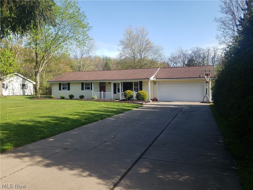 Completely renovated Hudson ranch! Improvements include: New furnace 2020. New A/C 2021. New hot water tank 2014. New well pump w/ wall pump saver 2018. New 125 amp electric panel 2013, plus already existing 50 amp panel (200 amp total). Recessed lighting added 2020. Luxury Wood Plank Vinyl Waterproof flooring throughout 2020. Front Porch added 2019. New shutters added 2013. Exterior painted 2011.
New windows throughout 2013 (except garage & laundry). New roof (Complete tear off to tresses) 2011. Deck added 2014. Landscaping front & back 2011. Lawn reseeded & graded 2011. Added full length treeline at deck & property line for added privacy 2014. New exterior light fixtures 2014. New garage door with new opener & keyless entry 2016. Installed ceiling lighting in bdrms (none available prior) 2012. Half bath COMPLETE remodel:floor to ceiling 2021. Full bath update to include new flooring, toilet, vanity, sink, paint, refinish bathtub 2021. New trim, baseboards, register vents, & closet d