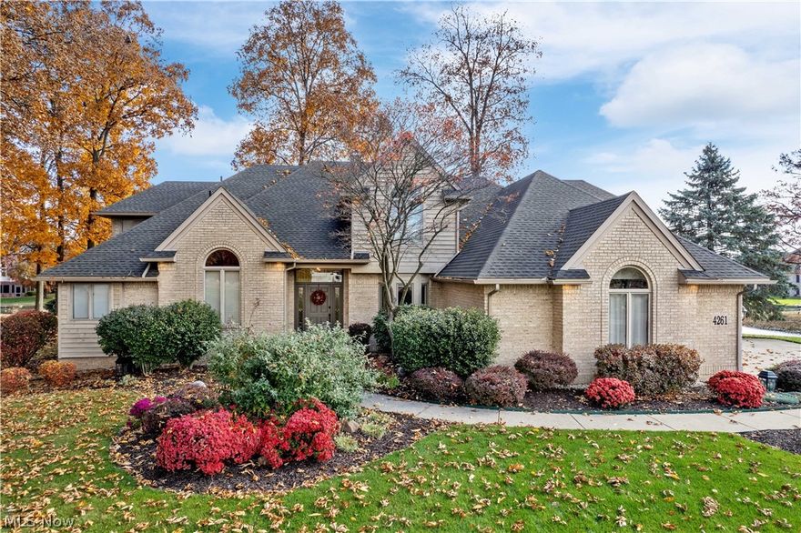 This custom-built solid brick home is located on stunning Swan Lake on Wooster’s north end.  The home is located on a cul de sac, nestled among majestic trees and gardens planted with flowering perennials. From the front door you enter a 2-story grand foyer with a beautiful staircase and hardwood floors.  The great room features a gas fireplace and massive windows overlooking the calming lake and landscaped lawn. The spacious deck is ideal for dining and entertaining.  The private dock sits on a stocked pond, offering easy access to fishing, kayaking, and paddle boating. Ducks and herons frequent the pond, in addition to the resident swans. The owner’s suite, on the main level, features a full on-suite bath and French doors leading to a private covered patio. The open kitchen includes a cozy hearth room. The kitchen offers Corian countertops, solid cabinets, pantry and stainless appliances.  Two half baths and the laundry room are also located on the main level.  Up the main staircase