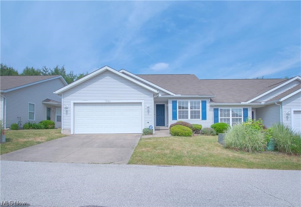 Fantastic ranch-style condo in Brittany Pointe! This beautiful two-bedroom, two-bath, offers over 1,300 Sq Ft of living space. An inviting foyer welcomes you and leads you into this well-maintained home. To the right is the first bedroom with a large window and closet. A convenient full bath is just around the corner. The beautiful ADA kitchen offers cabinets galore, a wheelchair-friendly sink, and a pass-thru window to the great room. The spacious great room features a gas fireplace with a large mantel, vaulted ceilings, an abundance of natural light, and sliding glass doors to the private patio, great for enjoying warm summer nights. Located off the great room is the master suite that features a walk-in closet (6x7) and a private master bath with a large vanity, an oversized mirror, and a walk-in shower. The first floor is completed by the laundry room with a utility sink and an attached 2-car garage with an access ramp. Along with ADA doorways, this home is handicap friendly. Don't