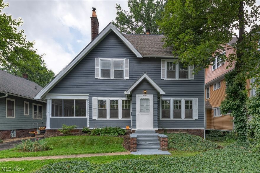 Charming, spacious, move-in ready Heights Colonial, with about 2200 sq ft of total living area, including the basement rec room. Gorgeous hardwood floors flow through most of the house, including the huge living room with fireplace, formal dining room, and kitchen. Right off the living room is an office/sun room with French doors AND a private screened-in sun porch. The kitchen includes all appliances, with LOTS of cabinets and counter space. Upstairs are 3 large bedrooms, completely updated full bath with newer fixtures and tile work, plus a walk-up attic, great for storage. The full basement includes a large rec room and second full bath. Other features: 1st-floor powder room, deep, fenced back yard with access to Cain Park plus a tree house, huge rear deck, newer roof, central AC, offered violation-free!