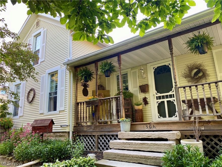 Welcome to your back yard oasis! Tucked away on Elm Street in beautiful South Amherst within the Firelands Local School District, you'll find this quaint, well maintained, farmhouse with lovely natural garden vignettes, floral lined walkways and shade covered coy pond. Plant a garden in raised garden beds and store all of your equipment in your gardening shed or small barn out structure. You'll feel the history of South Amherst with sandstone sidewalks and accents through out. Sip your lemonade on your 22 ft long covered front porch or lounge in the sun in the backyard gardens. You'll find 2 spacious bedrooms on the first level and 2 additional bedrooms on the second level. Perfect for multi-generational living or growing families. During Ohio's freezing winter, enjoy the added bonus of a gas wall heater. Brand new septic aeration installed 2018, new hot water tank 2020, new carpet 2022, roof, siding and windows 10 years old.