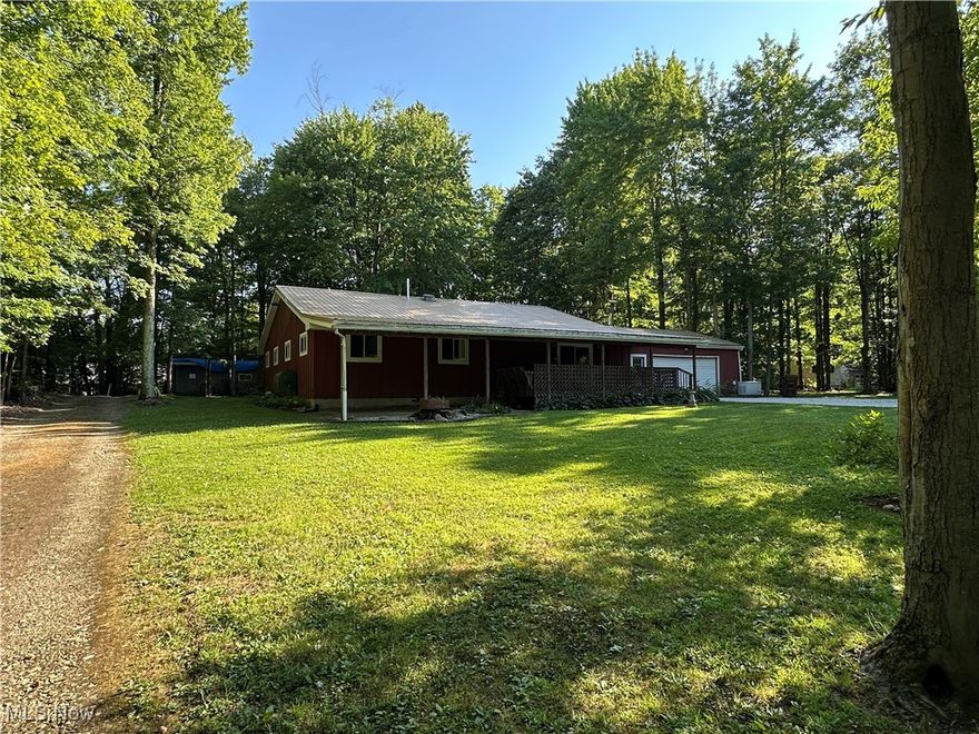 Welcome to this inviting 3-bedroom, 2-bath ranch-style cottage that blends cozy charm with spacious living. Step inside and you'll be greeted by a large dining room perfect for family dinners and special gatherings. The highlight of this home is the extremely large family room, offering plenty of space for relaxing, entertaining, or creating the perfect movie night atmosphere. The kitchen is a true delight, ample cabinet space, and a layout designed to make cooking easy and enjoyable. Step outside to your own private retreat! The wooded backyard is perfect for entertaining, gardening, or simply relaxing in a peaceful setting. Whether you're hosting a cookout, playing games, or enjoying quiet evenings under the stars, this outdoor space is sure to impress. Car enthusiasts, hobbyists, and DIY lovers will love the 2-car attached garage and the backyard barn/workshop. It's the ideal setup for extra storage, creative projects, or a dedicated workspace right at home. Located within walking distance of Pymatuning Lake, the home also includes a leased boat dock. Don't wait, homes like this don't last long! Schedule your private showing today and see why this one could be the perfect fit for you!