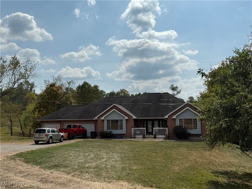 Built in 1998 this 4 bedroom 2 bath RANCH offers an open floor plan with room to grow.  Upon entering you are met with vaulted ceiling and spacious open airy flow.  To the left there is an additional bonus room which could be a great space for an office.  Kitchen is large with plenty of cabinets and counter space which is open to the dining area to keep the conversation flowing with the cook in the house.  This wing of the house is were you will find your primary bedroom and ensuite. Sliding glass door leads to the back deck for taking in nature at your leasure. Living room features vaulted ceilings and electric fireplace, and Sliding glass door leads to back deck as well. The opposite wing is where you will find 3 more bedrooms and main bathroom featuring spacious shower. Downstairs can be finished for a large family room.  Current basement level houses a huge exercise/weight room, a large gameroom, and is plumbed to add additional 3rd bathroom. This home also has a woodburner to provide additional heat in the winter.   So much potential with the massive sq footage available to make your very own!