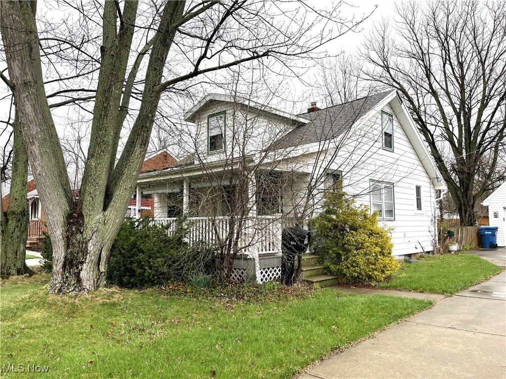 Opportunity knocks for a seasoned home renovator. 1920s bungalow and oversized 2-car garage on a 185' deep lot. Updates include a newer expanded kitchen, first floor laundry and spacious first floor full bath. The kitchen features a stainless steel refrigerator, wall oven and range hood along with Corian-type counters & abundant cabinet space. Stacking washer/dryer off the kitchen. The 1st floor bath includes a wide vanity, shower/tub combo, ceramic tile floor and linen storage. 2 bedrooms and another full bath are on the 2nd floor. The extra-deep garage includes a potential loft area. While there are already a number of updates to the property and its potential is great, there are items that will require immediate attention, including basement flooding due to a frozen/split water pipe, restoration of water service at the street and removal of fair amount of debris in the house & garage. Property is offered strictly as-is. Due to the conditions described only cash offers can be considered.