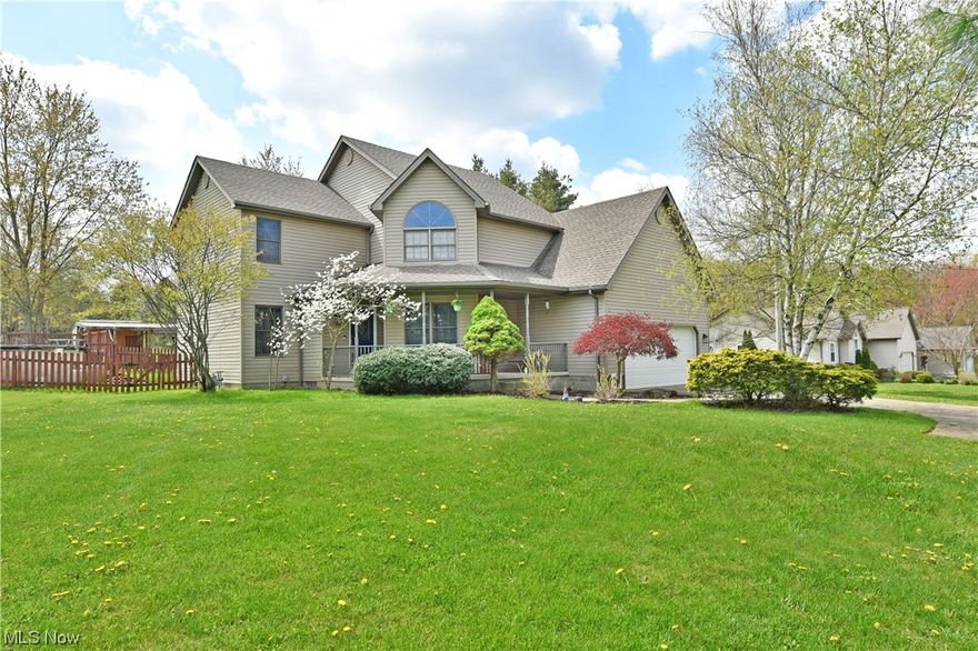 Country in Canfield! Have you been looking for some land and a newer construction home? These ones don't come around often in Canfield Schools! This sprawling 2200 sq ft 2 story home will check all the boxes! 2 car attached garage, above ground swimming pool with huge deck built around it, a fenced in area for the pets and lots of room if you want some chickens or even a horse! Enjoy the country views on the front porch swing! Inside offers a large great room with gas fireplace and new wood laminate flooring and a professional paint job throughout the first floor! Kitchen with oak cabinetry, ceramic tile floors and new stainless steel appliances, reverse osmosis system,all in excellent condition! A formal dining room currently being used as an office, and a dining area in the kitchen, great for entertaining. Huge 4 season sun room overlooks the back yard and back deck. First floor laundry and half bath for guests for added convenience! Upstairs is a main bath between two bedrooms, great for the kids with huge closets! Down the hall is an expansive master suite! The basement has dividing walls up and is ready to be finished for even more play/entertaining space! This home is meticulously maintained and also offers many new major upgrades such as, new Kinetico well equipment, new roof in 2020, new skylights 2023,picket fence 2021, glass pool filter, leaf net cover and pool cover 2020 , new sump pump.No city income tax! Make this one yours just in time for all the summer fun!