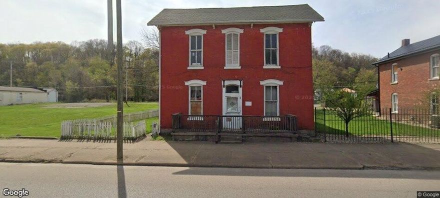 INVESTOR SPECIAL! 
Come check out this BLANK canvas! Building has been completely gutted to the studs. Opportunities galore! Second lot located in the back could be used as additional commercial space! Apartments, studios, coffee shop? Come see for yourself and make this your own! Property is AGENT OWNED.