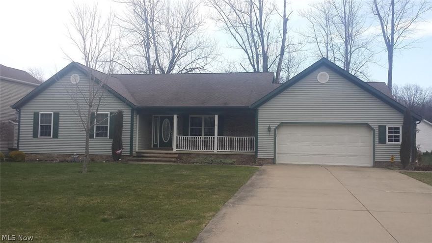 Spacious Ranch with great room style open floor plan. Living room has cathedral ceilings with cozy gas fireplace...opens up to large eating/dining area and large kitchen area with lots of cupboards, built-in desk and island with bar stools. Master bedroom has master bath with Jacuzzi tub and separate shower, along with his and hers sinks. 3rd bedroom is currently used as an office with a built in book shelve that does not stay and will be taken out and converted back to a closet. Huge, high basement intended to be finished...enough room for family and fourth bedroom if necessary. New sump pump with alarm back up and Generac Generator. Deck off back or front porch to sit and enjoy the Lake Erie view...or just walk to the Lake or to Saybrook  Park...or to near by  Restaurants! Nice area of homes in Century Bay Allotment.