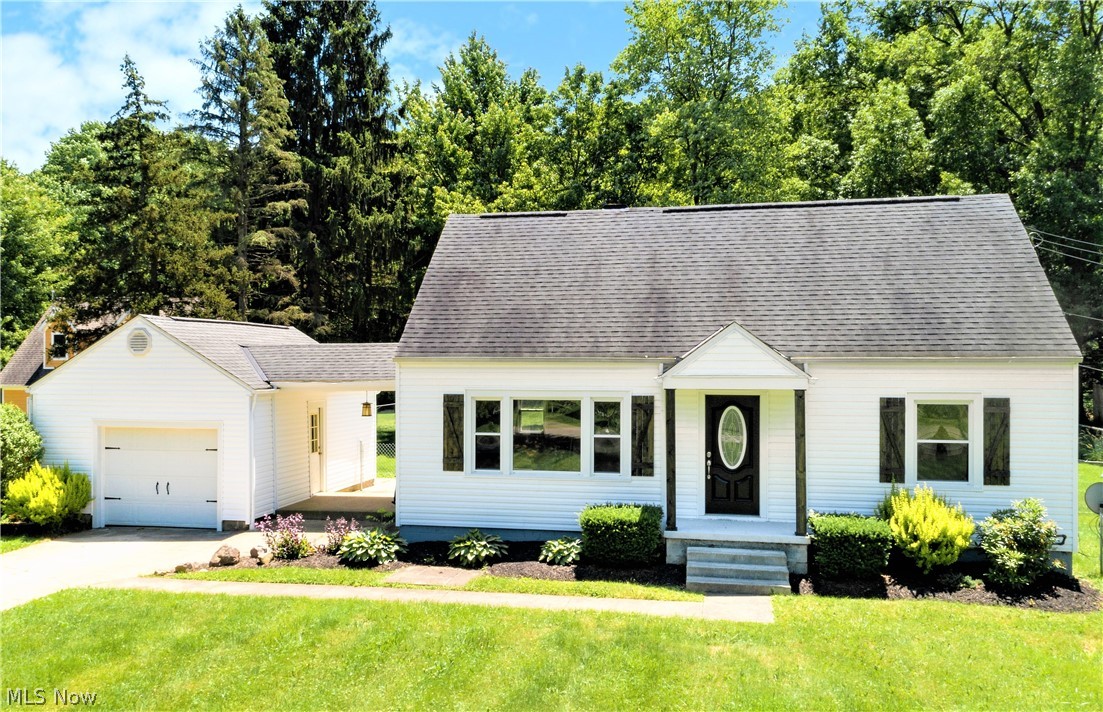 * Remodeled Home In Manchester W/3 Bdrms, 1 Bath, Garage, .62 ACRES AND A Gated FULLY FENCED IN Back Yard! *WIDE Concrete Driveway For 8+ Vehicles Is Also Great For Extra Turnaround OR Parking A Boat/RV! CLOSE TO PORTAGE LAKES! *The Fenced In Back Yard Is Primarily Flat, Making It Perfect For Swingsets, A Swimming Pool, Picnic Tables Or Perhaps Even Pets! *Back Concrete Patio Behind Garage *Cute Covered Attached Patio Between Home & Garage! *CUSTOM Barn Door Shutters *1ST FLOOR BEDROOM! *Feel Comfortable With A Newer: SEPTIC System, Architectural ROOF, WINDOWS, SIDING & HIGH EFF. FURNACE!! *Shiny Hardwood Floors & Picture Window In The Living Room! *New Bryant Evolution Touch Screen Thermostat *Modern Gray Flooring And Fresh White Trim In The Dining Area AND Kitchen! *UPDATED & Remodeled New Kitchen Features Sparkle GRANITE Countertops, SHAKER STYLE SOFT CLOSE Cabinets, White Subway TILE Backsplash, Matching Stainless Steel KitchenAid Appliances, Black Blanco Undermount Sink W/Faucet S