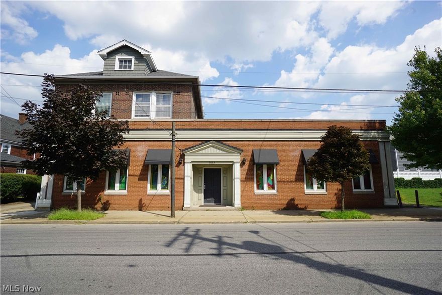 This solid brick building has most recently been used as an art gallery and gathering space for a church. Previously it was a funeral home. There is a living space on the second floor which is currently tenant occupied. This unique property is being offered along with the adjacent brick duplex, so two parcels for the price of one. The commercial space is zoned for 'local retail'. A stellar opportunity awaits the shrewd business person who wants to operate their business from this space and receive rental income; or a savvy investor who would rent the entire facility. Property has some deferred maintenance but overall very solid dwellings. Come and explore this diamond that just needs a little polish to make it shine.