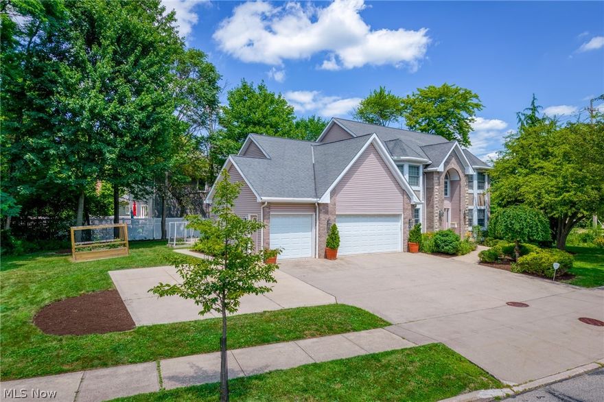 This custom-built 2004 colonial in Beachwood offers over 3,100 square feet of bright, open living space, plus an additional 1,740 square feet in the finished lower level. Lovingly maintained by just two owners, this move-in ready home showcases numerous modern updates and thoughtful upgrades.  A grand foyer with a central staircase creates an impressive first impression. The fully renovated 2019 kitchen features a large center island and flows seamlessly into the expansive family room—ideal for both everyday living and entertaining. Step outside to a private walk-out patio and deck overlooking beautifully landscaped grounds, perfect for gatherings or quiet evenings outdoors.  The first floor also includes a private guest suite (renovated 2025) with a full bath, two generous closets, and its own exterior entrance—an excellent option for multi-generational living. A first-floor laundry room, formal dining room, and living room complete the main level.  Upstairs, you’ll find four spacious bedrooms, including a luxurious primary suite (full renovation in 2025) with dual vanities, a soaking tub, and large walk-in closets. A second full bathroom, fully renovated in 2023, completes the upper level.  The fully finished lower level, featuring a fourth full bath, offers endless possibilities for recreation, a home gym, or additional living space.  A three-car garage provides ample storage for vehicles and outdoor equipment.  Entire home was freshly painted throughout in 2025.  This home truly checks every box—schedule your private tour today. Please contact the listing agent for a complete list of upgrades.