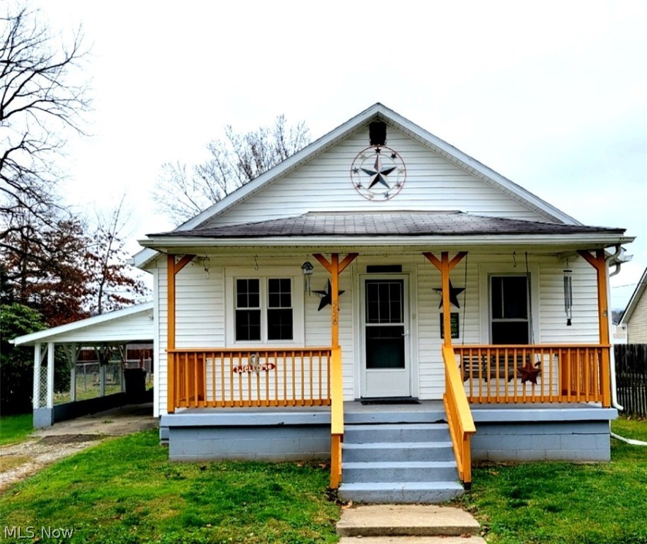 Cute, two bedroom bungalow in Franklin Local School District, updated electric in November 2022, nice size storage building remains with property, flat yard.