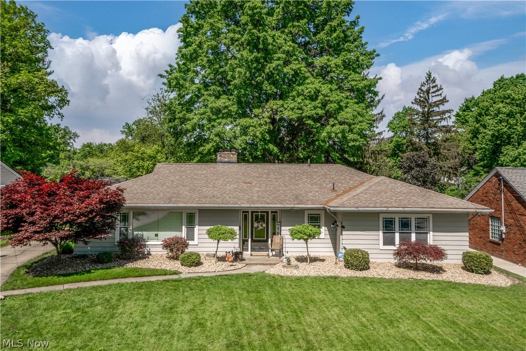 *HIDDEN GEM ALERT* This gorgeous one story ranch home has 2050 square feet of living space sits on almost a half an acre. Features 3 total garages, 1 attached, 2 detached plus large shed, landscaping has been immaculately maintained! This home has a great balance of space vs utility. Ductless A/C units and come with built-in WiFi. Amazing heated floors through-out the majority of the home! There are 3 large bedrooms, double closets in the primary. Kitchen comes with ample countertop space and storage.
Large living area has stone fireplace with gubs of natural daylight. DIRTY FEET? Take your shoes off in the updated mudroom. Gorgeous and updated bathrooms... This is it!! Make a private showing today before it's................................................................................................................................................GONE!