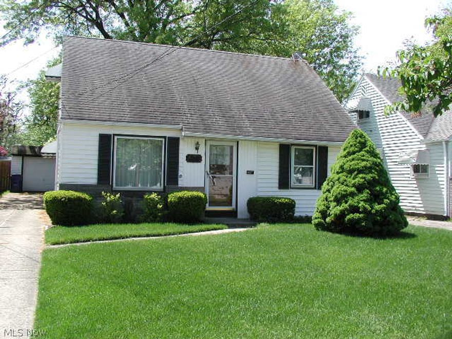4 Bedroom Vinyl Cape Cod Bungalow. Freshly painted Clean move in condition with new furnace Oct 2013, Nwr on demand hot water tank, updated bathroom, replacement windows and C-air. 1st floor master bedroom with hardwood flooring. 2 large bedrooms up with deep closets and a lot of extra attic storage space. Convenient 1st floor laundry off back entrance. Enclosed rear patio to enjoy the deep 185' yard. 1.5 car garage W/ door opener. Great location off Puritas and a FREE Home Warranty makes this a LOOK & BUY opportunity. Immediate Occupancy Available.