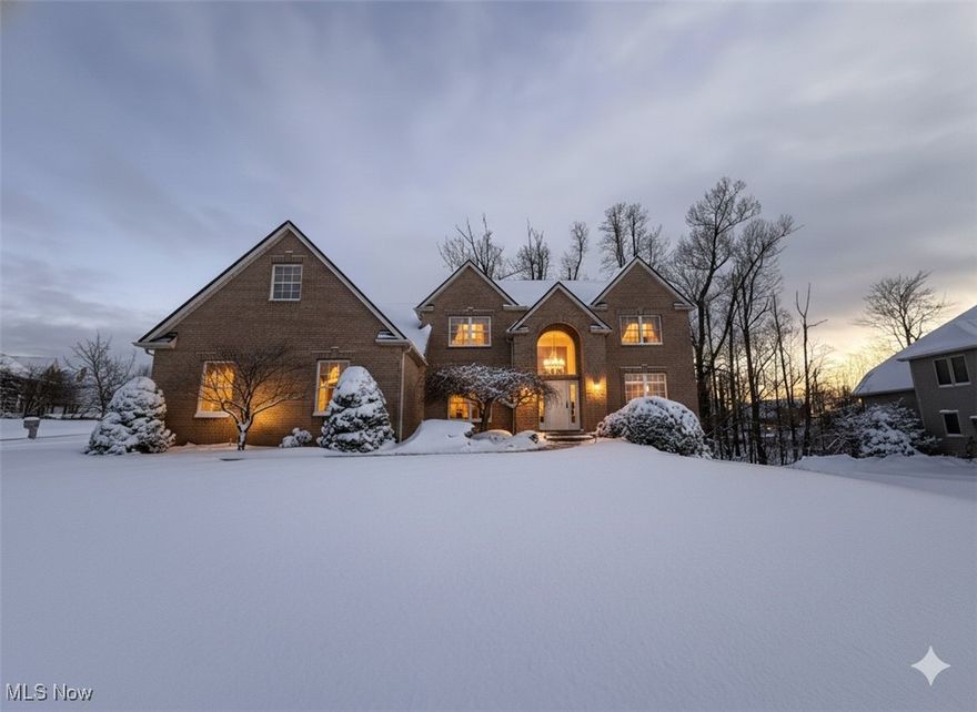 Nestled within the prestigious Southampton Woods subdivision, this impressive 5-bedroom, 3-full-bath Colonial is situated on a serene, private wooded lot and features a spacious 3-car garage. The home welcomes you with a grand two-story ceramic foyer leading into a sun-drenched, gourmet kitchen updated with granite countertops, an oversized center island, and high-end appliances that vent to the exterior—perfect for the culinary enthusiast. This entertainer's dream flows seamlessly from the breakfast area to a massive 800-square-foot custom deck overlooking a tranquil backyard. The main level showcases stunning solid hardwood floors (2021) throughout the formal dining room and a generous family room centered by a cozy fireplace, alongside a versatile first-floor bedroom or office and a full bath. Upstairs, you will find a vaulted owner's suite with a walk-in closet and private bath, plus three additional spacious bedrooms. With a massive 1,689-square-foot walk-out basement and significant recent upgrades—including a new roof (2025), furnace (2021), and hot water tank (2021)—this home is move-in ready for a summer of relaxation and luxury.