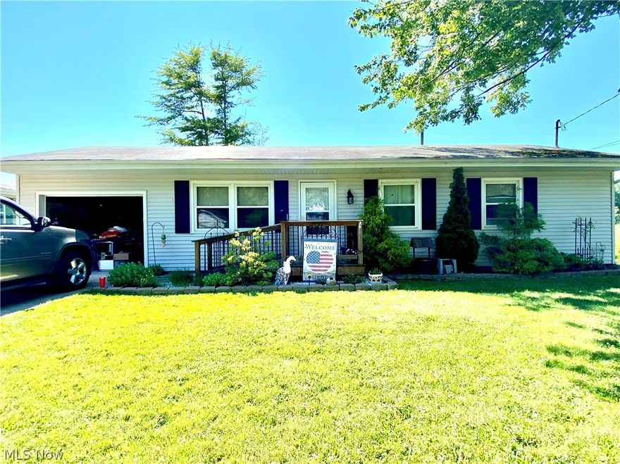 Welcome to this adorable 3 BR/1  Bath ranch  situated within  minutes of the famous Geneva on the Lake strip and beaches to Lake Erie.  This  home features an eat-in  kitchen, a large up-dated bath and large utility room with an outside door to the back yard that is enclosed by chain link fence.  What a great feature for small children and family  pets.  There are 3 good  sized bedrooms.  There is a lovely back yard as well as a great front yard.  Enjoy the attached garage with rear door to the back yard.  Vinyl siding for easy care.  This home is  waiting for you.