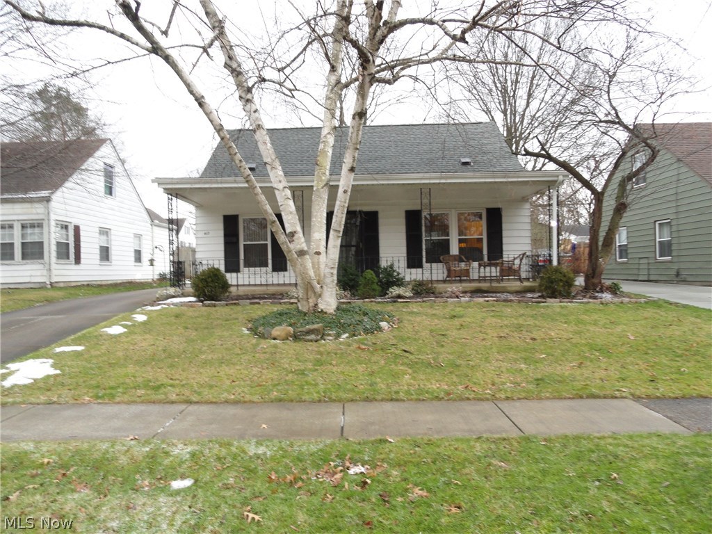 Charming Cape with attractive curb-appeal and an inviting front porch. Lovingly maintained , clean and cozy with tasteful décor throughout. Small addition creating a mud room, breakfast nook and an expanded kitchen with nice open dining area. Fully applianced kitchen includes a newer stove and the laundry room has a very nice newer stackable washer and dryer. New roof, gutters and downspouts in 2012. Nicely updated bathroom too. Concrete driveway leads to 2 car garage. Sunny backyard. Desirable Cuyahoga Falls neighborhood surrounded by nicely maintained homes.