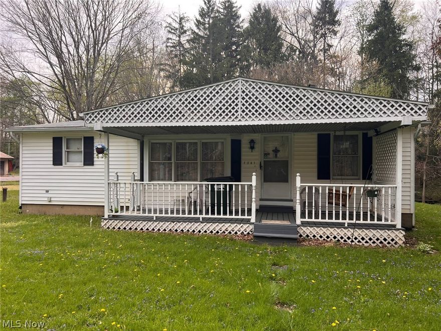 Welcome to 1241 Bison St. This two bedroom, two bathroom home sits on just over an acre of land. The lot is divided into two sections, the front portion offers lawn space, complete with fenced in dog yard. The back section of the lot, which is separated by a stream flowing through the yard, features a wooded hillside which has endless possibilities for the nature lover. The spacious two car garage has a mechanics pit. The interior of the home, features built-in drawers in the dining room and bedroom, along with a bult-in eat in bar. The family room offers a connection and chimney for a wood burning stove to be placed for winter time heating. The unfinished basement has updated HVAC and water heater. This property is connected to city water, but also has option to be hooked up to a well. Whether you are looking for the retro appeal or a home ready to be updated with a modern touch, 1241 Bison is ready for you.