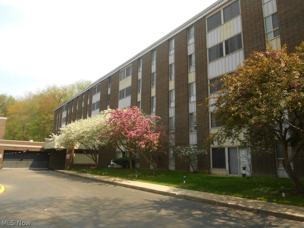 Rarely available ground floor condo in "C" building! Super sharp, won't last! Ceramic tile entry and bright eat-in applianced kitchen with newer laminate flooring. Kitchen, living and dining area has been freshly painted. Updated full bath vanity, mirror and fixtures. Enjoy the 3 season sun room with newer ceramic tile flooring and sliders that provide easy access to walk outside. Condo includes garage space 152 and storage unit #37. Community amenities include party room, guest suites, outdoor heated pool, exercise room, bocce ball court, clubhouse and more. Condo maintenance fee covers all utilities (even cable), except for phone.