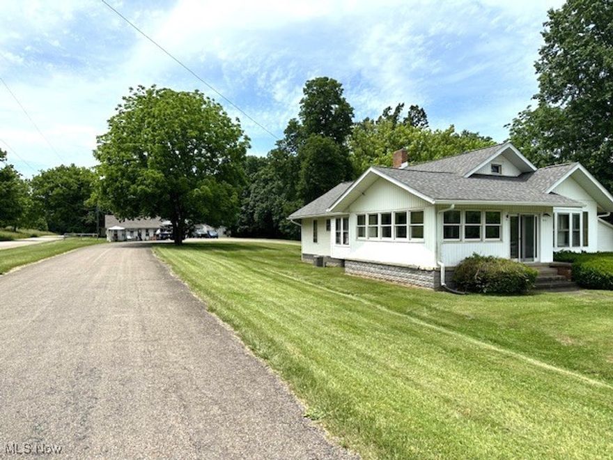 This property features a 3-bedroom, 2-bath home with a 3-car garage Marketed at $1700 per month. (New flooring and Paint in this unit) There's also a 1-bedroom, 1-bath home with an enclosed porch renting for $750 per month. The duplex has two units, each 1-bedroom and 1-bath, with laundry facilities. One-unit rents for $850 per month, and the other for $750, both measuring 1,200 sq. ft. The rear home is a 1-bedroom, 1-bath with a 1-car garage, renting for $750 per month. Additionally, there's a trailer pad on the property renting for $275 per month, with the tenant owning the trailer. All of this is situated on 5 acres in the Maysville School District.
Owner pays water and mowing the tenants pay all other utilities.  New flooring and paint in the large house in the front and newer roof, new hot water tank in the very back building.