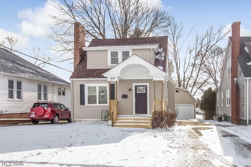 Must check out this amazing completely remodeled 4 bedroom, 2 1/2 bath bungalow. It features an open floor plan with a beautiful dining room with gorgeuos wood laminate flooring is open to the living room with a decorative fireplace and brand new carpeting. The living room features large windows that allows plenty of natural light in.  Beautiful kitchen that has been completely updated with gorgeous white cabinets, tile backsplash, granite countertops, wood laminate floors and new stainless steel appliances.  The room off the kitchen is perfect for an eat in kitchen, sitting room, den or playroom.  Full bath on the first floor with new vanity, fixtures and beautiful custom tile shower. One bedroom of the bedrooms is on the first floor.  Second floor offers spacious maser bedroom with large closets, 2 additional bedrooms and a full bath with custom tile shower.  Nicely finished basement with an updated ½ bath.  The 2 car detached garage has a walkable loft above the garage with a pull d