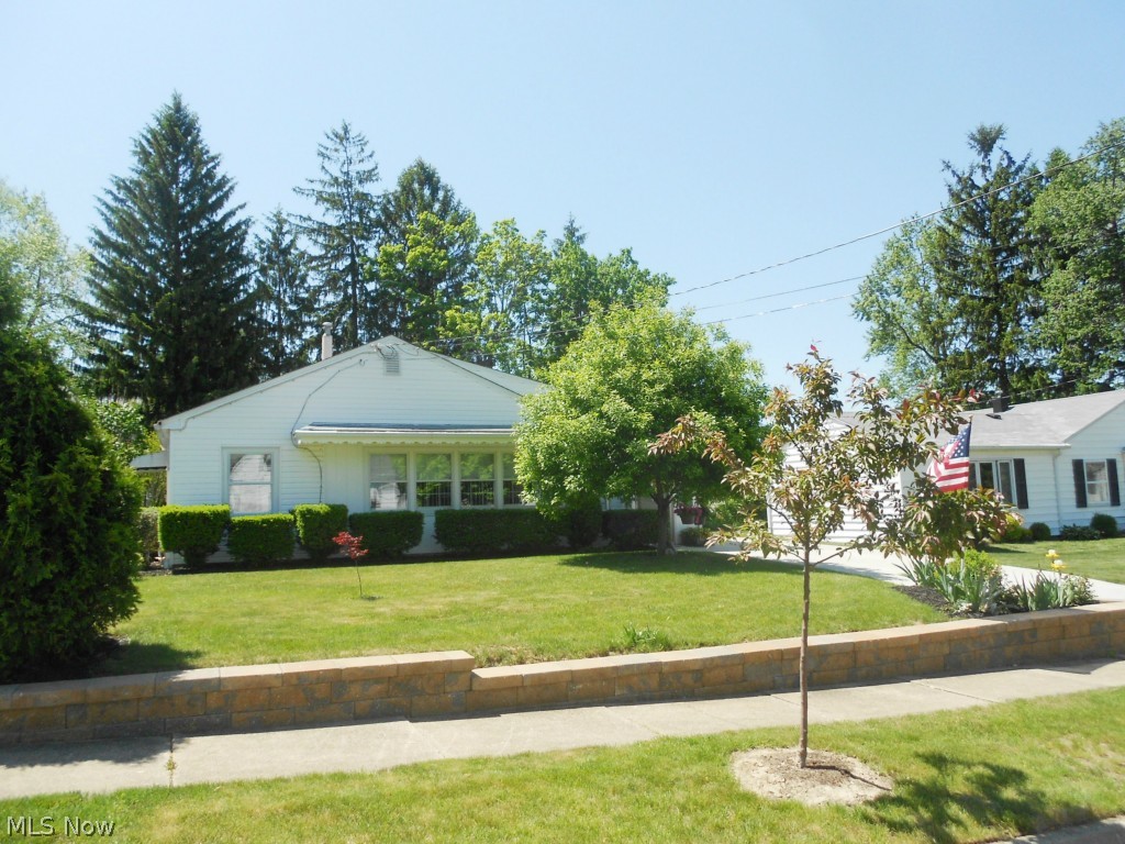 Are you looking for 1 floor living, which could be an alternative to condo living with nothing to do? This property will fit your needs and is in a wonderful location – close to Portage Crossing. Only 2nd owner in 65 years = a well loved and maintained property. This 3 bedroom home features a spacious living room and an eat-in kitchen with lots of natural light. Off the kitchen a convenient laundry room offers ample storage. Enjoy the outdoors from the comfort of the 3 season sun room. A bonus room off the master could be used as an office, walk-in closet, or an exercise room and has a door (installed 2012) which leads to the fabulous backyard. Updates include a brand new concrete driveway (2012 – previously it was gravel), front yard landscaping wall (2013) and newer roof (8-9 years young). 2014 updates include garage roof, carpeting in back bedroom, hall & living rm, A/C installed and hot water tank. 1 ½ car garage plus a room for workshop, hobby room or storage complete thi
