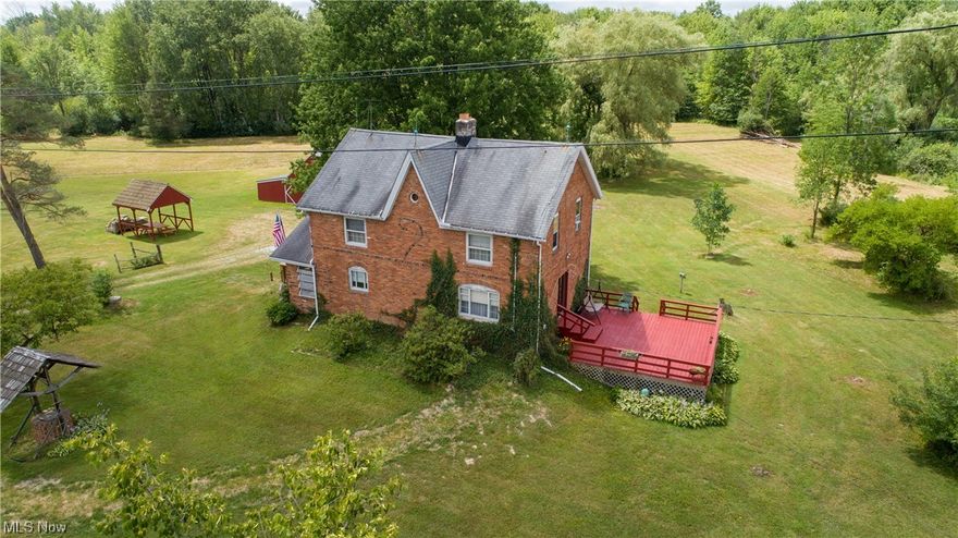 Quiet and beautiful country living characterizes what you'll find on the 10.81 sprawling acres and traditional brick farmhouse at 10618 Plank Rd in Montville. If you are seeking a larger lot of both open and wooded land with wide frontage to build a new home or outbuilding, raise horses or livestock or enjoy outdoor activities and entertaining, this property will fit your needs. OR...If you are seeking a structurally sound home with a huge kitchen, first floor laundry,  and so much more that has all been loved and cared for by the same owners for nearly 70 years, we've got you covered there too! The gorgeous acreage boasts an extra wide desirable 200-300 feet of frontage, barn with lean-to, one car garage, pavilion, overgrown pond ready for restoration and plenty of land for your heart's desires! In and outside the lovely brick home, enjoy peaceful moments in your enclosed front porch with slate floors, sitting fireside in the light-filled living room with the woodburning fireplace or