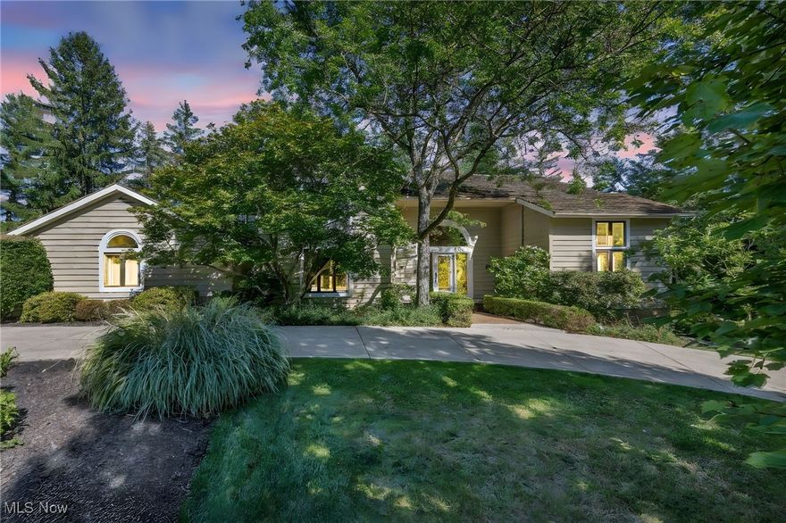 Welcome to this stunning modern contemporary colonial in the prestigious city of Pepper Pike, one of Northeast Ohio’s most sought-after communities, known for its tree-lined streets, serene setting, and top-rated school district consistently ranked among the best in the state. This beautifully updated home features 4 spacious bedrooms, 3 full bathrooms (including one on the main level), and a convenient half bath for guests. The functional and elegant layout includes a first-floor laundry room. The updated chef’s kitchen is a showstopper with granite counters, a breakfast bar island, ceramic flooring, stainless steel appliances, and skylights that bring in natural light. Just off the kitchen, a side porch leads to the private pool area, perfect for entertaining. A dramatic open foyer with soaring ceilings and hardwood floors flows into the dining and living rooms, anchored by a double-sided fireplace. Step out from here onto a spacious deck, ideal for morning coffee or evening gatherings. Upstairs, the luxurious master suite boasts an en-suite bath and walk-in closet, while three additional bedrooms and another full bath provide comfort and convenience. The home also features a 3-car oversized attached garage with an upper storage area and a horseshoe driveway offering ample parking. Outdoors, the fenced-in, heated inground pool with a diving board is the highlight, complemented by a patio and plenty of space for lounging and relaxing. Living in Pepper Pike means embracing a lifestyle in a peaceful community with easy access to I-271, upscale shopping at Pinecrest, and access to country clubs, golf courses, and dining. The Orange City School District is renowned for its exceptional education and strong sense of community, making this home the perfect blend of modern updates and resort-style amenities. Don’t miss the chance to make this Pepper Pike gem your new home!