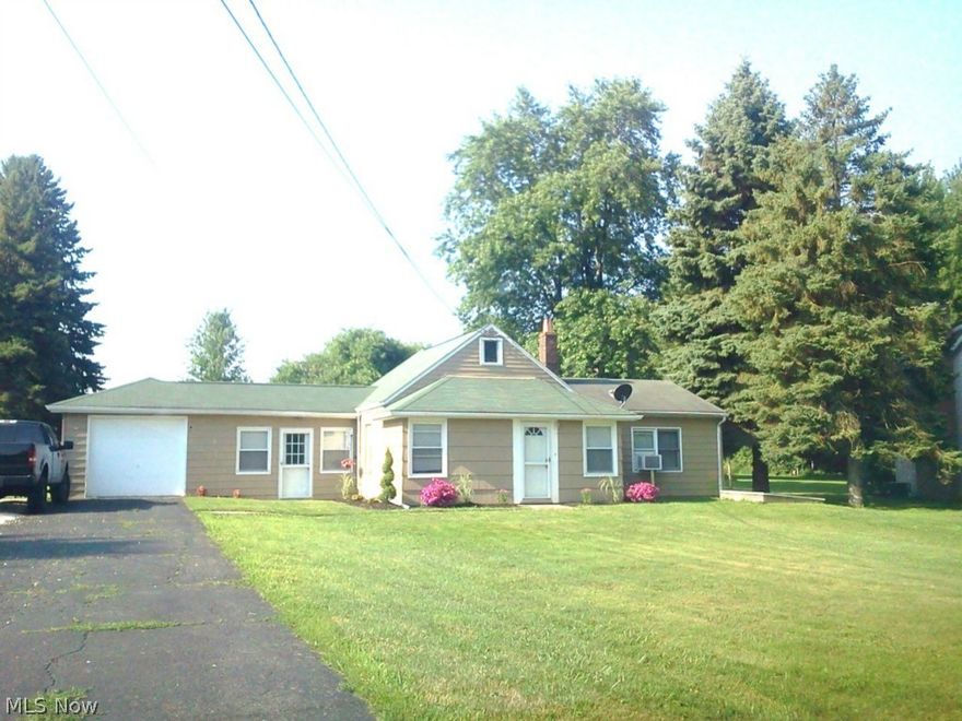 Sweet ranch  with 2 bedrooms sitting on 1 acre in Plain township. This is better than renting: 1 acre property as a blank slate to add to the house. This 2 bedroom doll house gives you the feel of being at a vacation beach house all year! All ONE  floor lifestyle with plenty of updates: electrical box 2014, baseboard heaters 2013, bathroom and kitchen, replacement windows, garage door opener & storm doors.  Pull down attic access for additional storage and outside shed. Priced affordably and located in close proximity to retail stores, food places and highways. Electric approx. $100 per month. Sewer approx. $53 every three months.