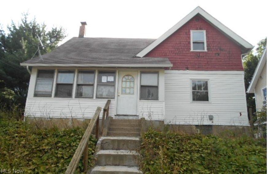 Three bedroom, 1.5 bath cape style home sitting on a hill in Goodyear Heights.  Home has an enclosed porch, fireplace and a 1 car detached garage.  To be sold AS IS. Buyer responsible for due diligence inquiry of all property information. Room sizes are approximate and not guaranteed. Condition of any appliances are not warranted.  Closing agent of Buyers choice.  FHA Financing subject to FHA Appraisal. FHA financing UI (Ui - Uninsured)