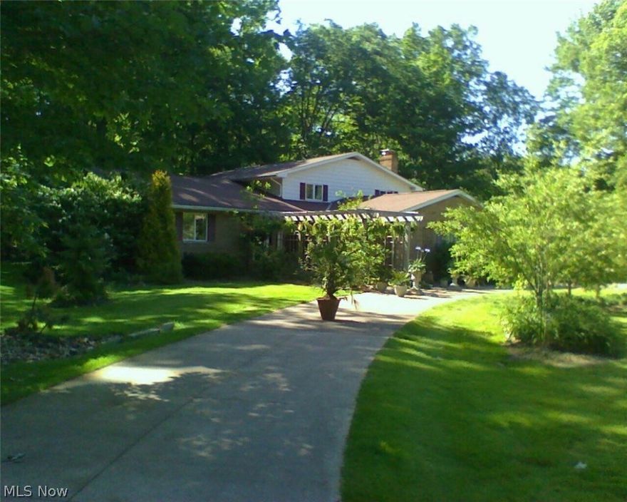 Big Family? * Like to Entertain? * Indoor Pool Parties? * Huge 3,416 SF, ‘FOUR’ Level Split/Colonial * Owners Are Interior/Floral Designers So This Is Not Your TYPICAL Home * Every Room Has Its Own UNIQUNESS * Beautifully Decorated With Elegance & Charm * Many Updates Within The Last 15 Years: New Kitchen, Bathrooms; Most Flooring; Landscaping; Most Fixtures; HWT; Garage Door; Interior Painting Within Last 3 Years * 5 Bedroom’s, 3 Full Baths, Vaulted Ceilings In Foyer, Living Rm & Dining Room * Kitchen Has Granite, Appliances, Including Freezer, Center Island, Pantry W/French Doors & Greenhouse Window W/Seating In The Dining Area * Master Bedroom Has 2 Walk-In Closets & Master Bath * All 4 Upstairs Bedrooms Have Double, Lighted Closets & Ceiling Fans * Marble Floors In Formal Dining Rm, Living Room Plus In The Foyer Which Has A Curved Staircase * 3 Steps Down To Bedroom #5 and a Family Room W/Track Lighting, Stone-Wood Burning Fireplace PLUS Another 20 Ft Family Room W/Ceramic Tile Plus Two 7x6 Rooms-One Is Used As A Bar * Then Walk Out To The Glass Enclosed, In-Ground, Heated, Pool (Gas Heater 10 Yrs Old &amp; Liner Approx. 5 Years)-Sellers Use Pool Year-Round * Finished Basement with yet ANOTHER Family Room Plus Office or Work-Out Room and a Storage Room * 2 Concrete Patios, 26x16 & 20x12 * 2 Car Att Gar W/AGDO * Circular Driveway * If You’re Looking For Privacy, This Home Sits On Almost 2.5 Wooded ACRES Near Golf Course * ONE YEAR HMS HOME WARRANTY