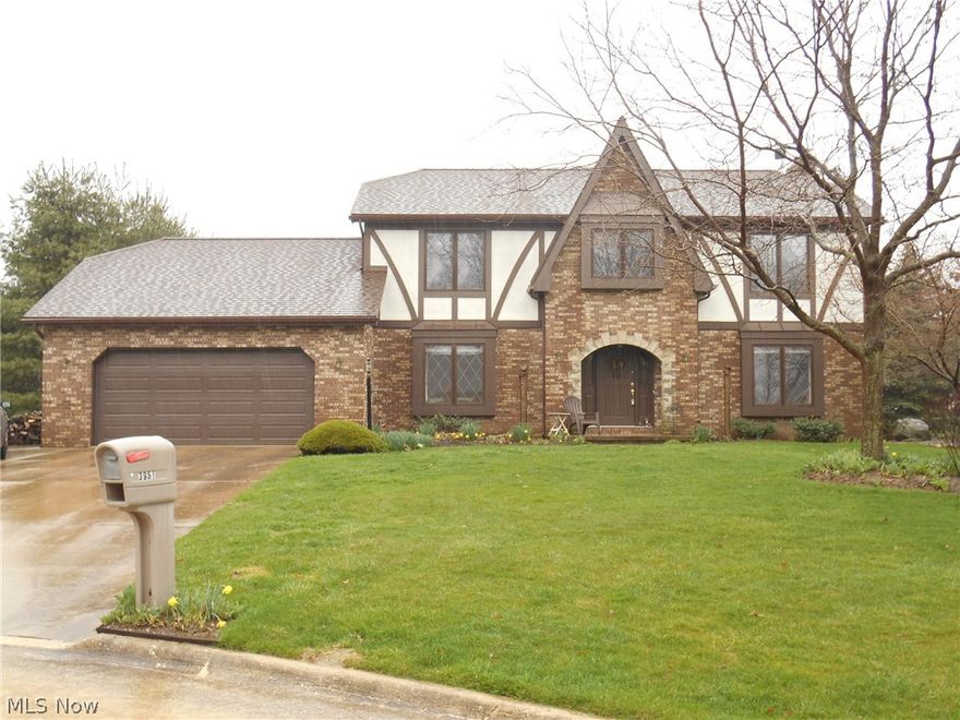 Welcome to this fabulous Tudor style home located in desirable Green locale. This amazing abode is completely updated from top to bottom. There are 4 nicely sized bedrooms and 3 baths. The kitchen has new cabinetry, ceramic flooring, granite counter-tops and comes fully applianced. The great room has a beautiful fireplace. There is a formal dining room perfect for entertaining. The master bathroom has been completely updated and has a new skylight. There is a huge basement just waiting to be finished. There is a new reverse osmosis system for the water system. Enjoy summer evenings on your covered back porch. All of this and the home is situated on a private cul-de-sac. Green local schools! Stop looking! This is the one! Call to schedule a showing today!