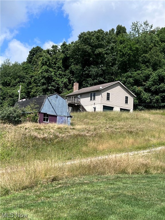18.70 Acres, mostly wooded, mineral rights will transfer. This home is large on views with plenty of room to hunt!! The home was custom built in 2007. Open concept living, many windows to enjoy the beauty of tis valley, year round. The home features a custom Mullet kitchen with oak hardwood flooring. Solid 6 panel doors through out. The lower level has pored concrete walls and 9 ft garage doors, with a nice laundry area and a possible family room with a wood burner. Geothermal heating and cooling.