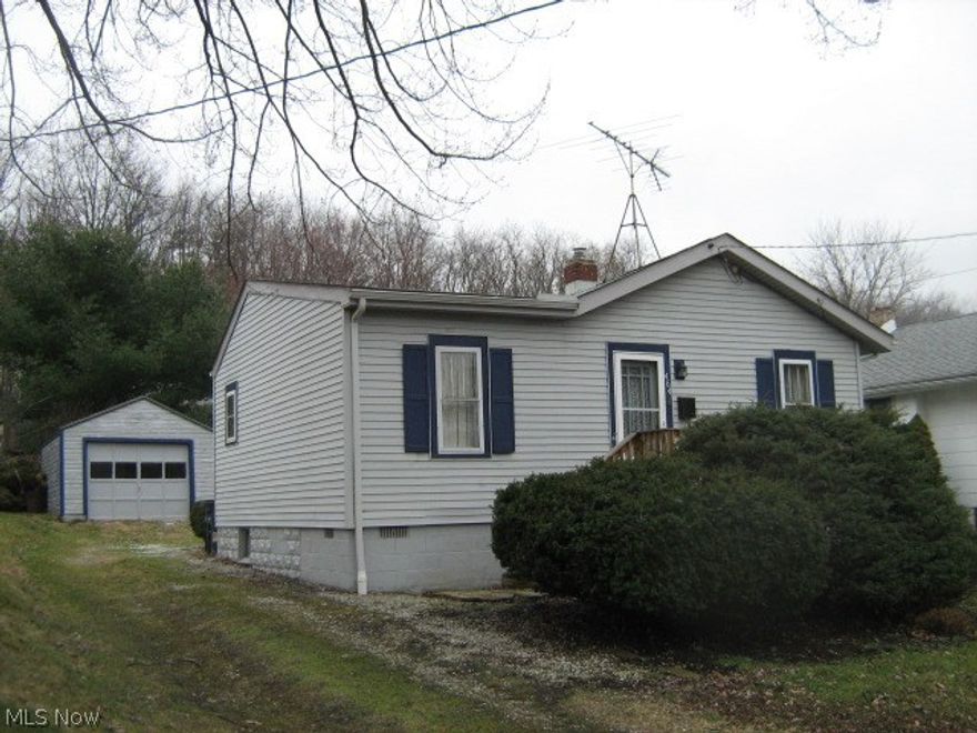 Why rent? Enjoy your own space and privacy close to Goodyear Heights Metro park! Window A/C units,'15, roof and gutters '07, blown insulation '06. Lighted ceiling fan in kitchen with handsome wooden cabinetry. Brand new refrigerator included!