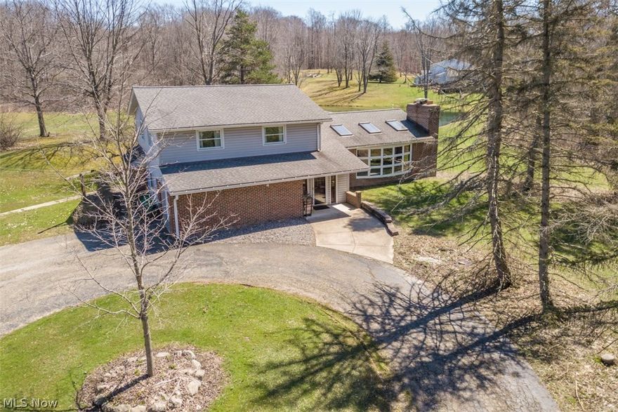 Nature Retreat on 5.35 Acres with a Pond.  4/5 Bedrooms with 2 full baths and an additional sink/shower in the lower level bsmt area.  Newer windows/screens and skylights. Basement has been waterproofed.  First lower level can be used as family room or master bedroom and has a full bath and newer sliders leading to outside.  Newer Burminham Boiler systemHome has been very well maintained.  Sunroom adds additional views of the Pond.  Natural Gas is at the street.  Outbuilding used for horses in the past.  Shed has concrete floor.  1 year Americas Preferred Home Warranty Included.