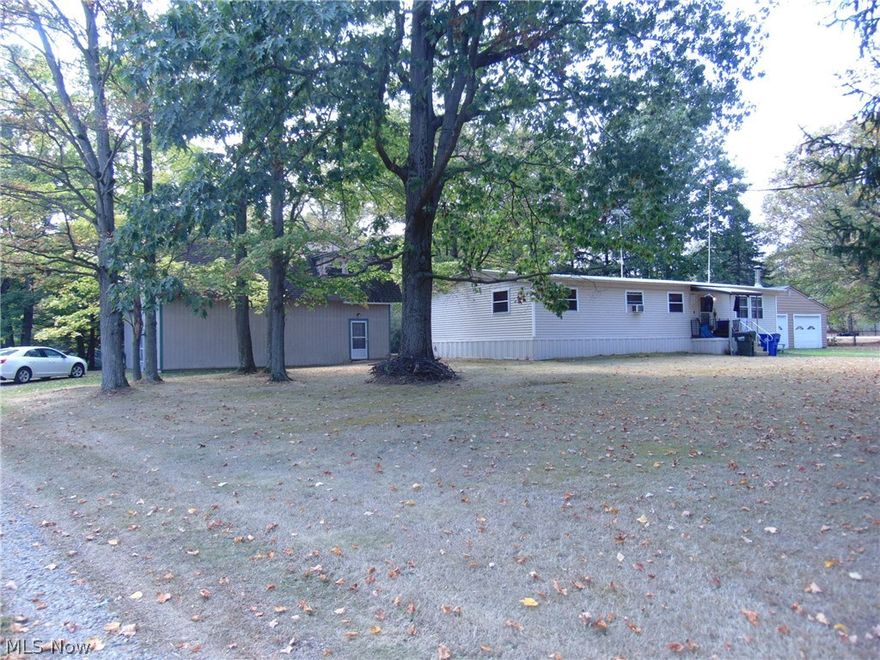 Welcome to this wonderful opportunity to own this home on over 4 acres. Home has 3 bedrooms, 2 baths and has a two car garage. Also you will find an additional sweet with a two car garage, 2 bedrooms, and a bath.
